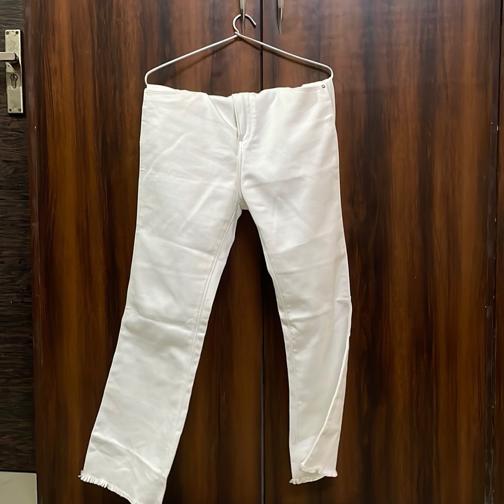 White flared jeans by Kasually